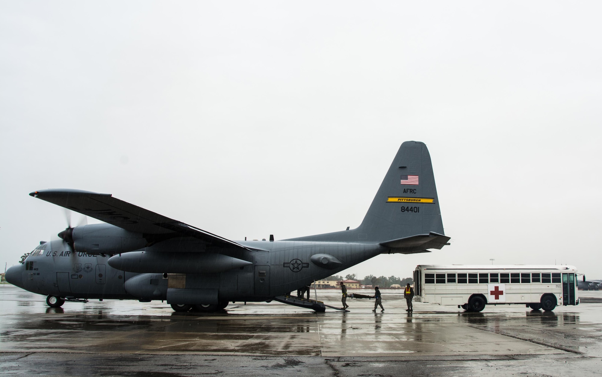 Members of the 60th Inpatient Squadron deliver a patient onto C-130 Hercules from Pittsburgh Air Reserve Station, Penn., during Patriot Delta at Travis Air Force Base, Calif. on March 24, 2017. Members of the 60th IPTS participated in the Air Force Reserve exercise Patriot Delta, providing enroute patient care and staging the medical manikins. (U.S. Air Force photo by Staff Sgt. Daniel Phelps)