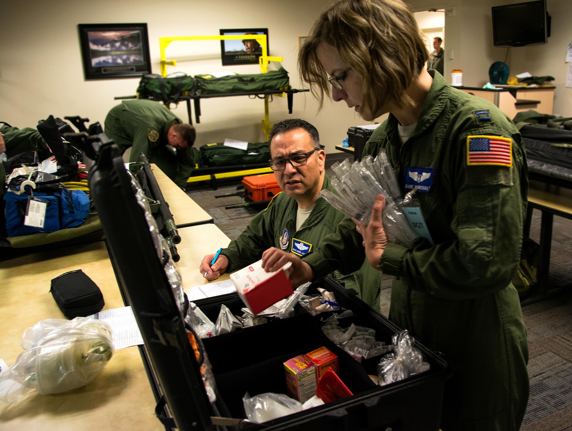 Senior Master Sgt. Gabriel Aguilar, 349th Aeromedical Evacuation Squadron superintendent of nursing services, and Capt. Diane Marshall, 932nd Aeromedical Evacuation Squadron flight nurse, perform inventory on medical equipment during Patriot Delta at Travis Air Force Base, Calif. on March 24, 2017. Patriot Delta brought in aeromedical evacuations squadrons from the from the 911th Airlift Wing at Pittsburgh Air Reserve Station, Penn., the 908th AW at Maxwell Air Force Base, Miss.; the 932d Airlift Wing at Scott AFB, Ill.; and the 349th Air Mobility Wing at Travis AFB. (U.S. Air Force photo by Staff Sgt. Daniel Phelps)