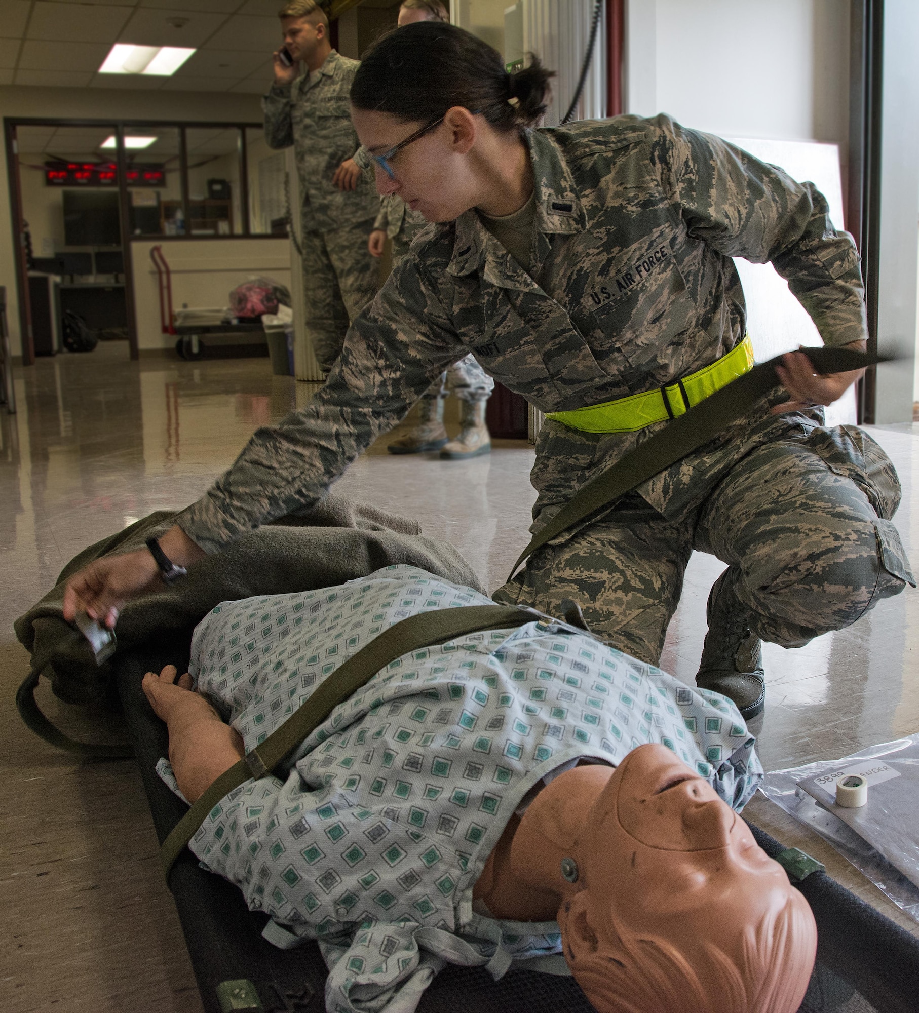 1st Lt. Andrea Nofi, 60th Inpatient Squadron nurse, stages a medical manikin at David Grant U.S. Air Force Medical Center at Travis Air Force Base, Calif., on March 24, 2017. Members of the 60th IPTS participated in the Air Force Reserve exercise Patriot Delta, providing enroute patient care and staging the medical manikins. (U.S. Air Force photo by Staff Sgt. Daniel Phelps)