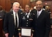 In honor of Women's History Month Capt. Nikki Slaughter-Smith, 328th Combat and Operational Stress Control, Army Reserve, was recognized along with several other prominent women during a special ceremony at the Buffalo N.Y. Veterans Court March 28, 2017.  She was recognized for her outstanding leadership and dedicated service to our country and our courts as a part-time Soldier, full-time Citizen Airman social worker with the 914th Airlift Wing, Air Force Reserve, and volunteer Veterans Court Mentor.  Pictured with Capt. Slaughter-Smith is Robert T. Russell, Veterans Treatment Court Judge (right), and Jack O'Connor, Veterans Court Mentor Coordinator.  (Courtesy photo)