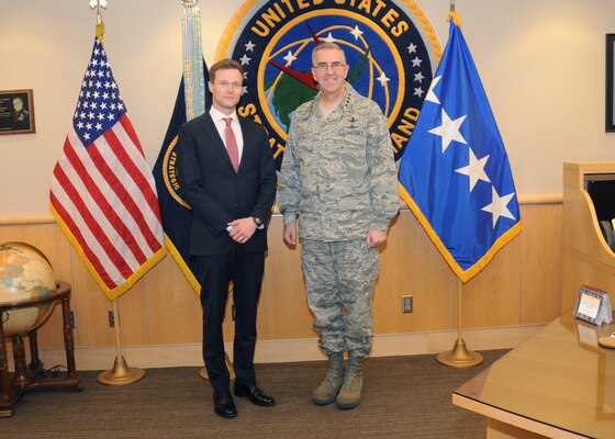 U.S. Air Force Gen. John E. Hyten (right), commander of U.S. Strategic Command (USSTRATCOM), welcomes Dr. Matthew Kroenig, associate professor in the Department of Government and School of Foreign Service at Georgetown University and a senior fellow in the Brent Scowcroft Center on International Security at The Atlantic Council, to USSTRATCOM headquarters, Offutt Air Force base, Neb., March 29, 2017. While here, Kroenig held discussions with Hyten and delivered a presentation to command members on “The Logic of American Nuclear Strategy.” In his remarks, Dr. Kroenig discussed the advantages and disadvantages of nuclear superiority; his perspective of nonproliferation; the results of hypothetical nuclear conflicts and crises; and other topics related to global nuclear capabilities. Georgetown University is one of more than 30 local and national academic institutions that make up the Deterrence and Assurance Academic Alliance – an organization that was started in Oct. 2014 to stimulate new thinking and develop future generations of deterrence practitioners. One of nine Department of Defense unified combatant commands, USSTRATCOM has global strategic missions assigned through the Unified Command Plan that include strategic deterrence; space operations; cyberspace operations; joint electronic warfare; global strike; missile defense; intelligence, surveillance and reconnaissance; and analysis and targeting. 