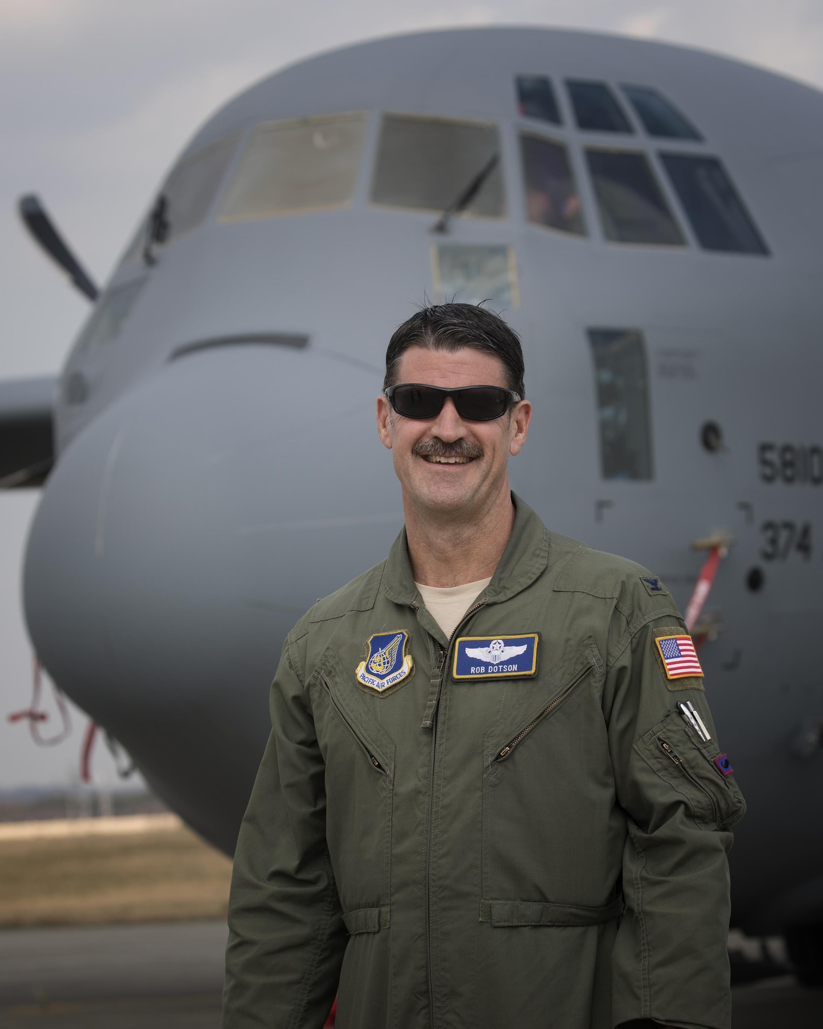 Col. Robert Dotson, 374th Operations Group commander, poses for a portrait after landing at Yokota Air Base, Japan, March 29, 2017. This is the second C-130J delivered from Lockheed Martin, less than a month after the first was delivered March 6th. (U.S. Air Force photo by Yasuo Osakabe) 