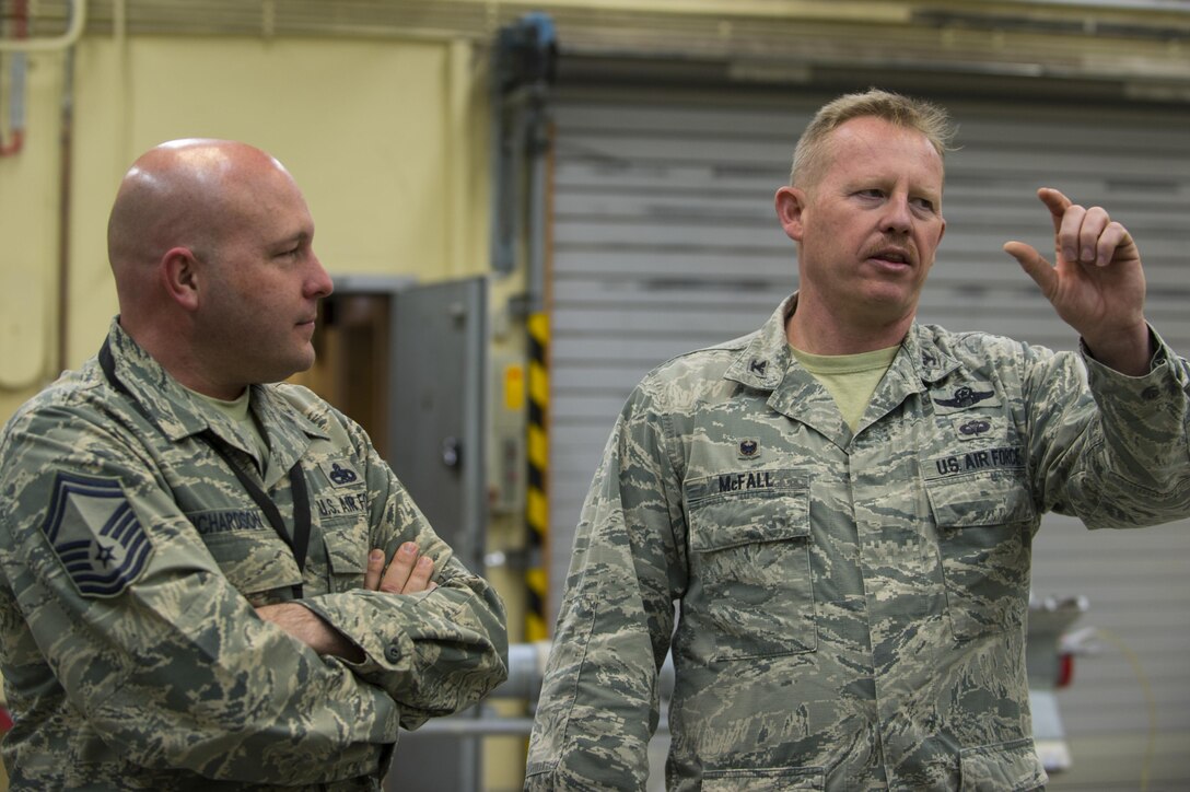 U.S. Air Force Col. Joseph McFall, 52nd Fighter Wing commander, speaks with Airmen from the 52nd Maintenance Squadron munitions section about the impact munitions have when piloting an F-16 Fighting Falcon during a Saber leadership “out and about” event at Spangdahlem Air Base, Germany, March 27, 2017. The 52nd MXS offered the hands on experience to Wing leadership to help them better understand the full spectrum of munitions building training. (U.S. Air Force photo by Senior Airman Dawn M. Weber)