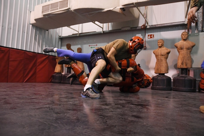 U.S. Coast Guard Petty Officer 2nd Class Michael Deane, a maritime enforcement specialist from Molalla, Oregon, dressed in Red Man attire engages members of the Egyptian military on visit, board, search and seizure (VBSS) tactics. The Patrol Force Southwest Asia (PATFORSWA)-led VBSS exercise with Jordanian and Egyptian navies served to strengthen long-term relationships and enhance mutual capabilities to ensure the free flow of commerce. (U.S. Navy photo by Mass Communication Specialist 2nd Class Kevin Steinberg)