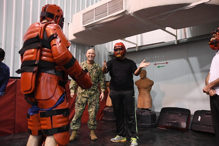 U.S. Coast Guardsmen interact with a member of the Jordanian navy on visit, board, search and seizure (VBSS) tactics. The Patrol Force Southwest Asia (PATFORSWA)-led VBSS exercise with Jordanian and Egyptian navies served to strengthen long-term relationships and enhance mutual capabilities to ensure the free flow of commerce. (U.S. Navy photo by Mass Communication Specialist 2nd Class Kevin Steinberg)