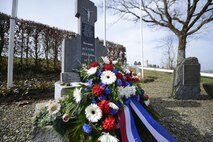A wreath is laid at the foot of the Wereth 11 memorial in Wereth, Belgium, March 24, 2017. The memorial was established in by community members of the village of Wereth to commemorate 11 African American soldiers who were tortured and executed by the Nazi SS Dec. 17, 1944. History has memorialized them as, “The Wereth 11.” (U.S. Air Force photo by Tech Sgt. Sara Keller)