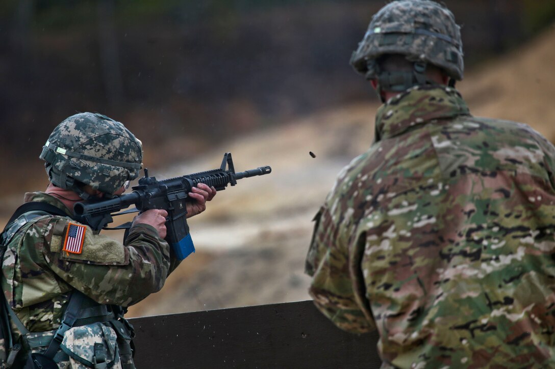 New Jersey Army National Guard Sgt. Michael Henri competes in a timed stress shoot during the Best Warrior 2017 competition at Joint Base McGuire-Dix-Lakehurst, N.J., March 28, 2017. Air National Guard photo by Master Sgt. Matt Hecht