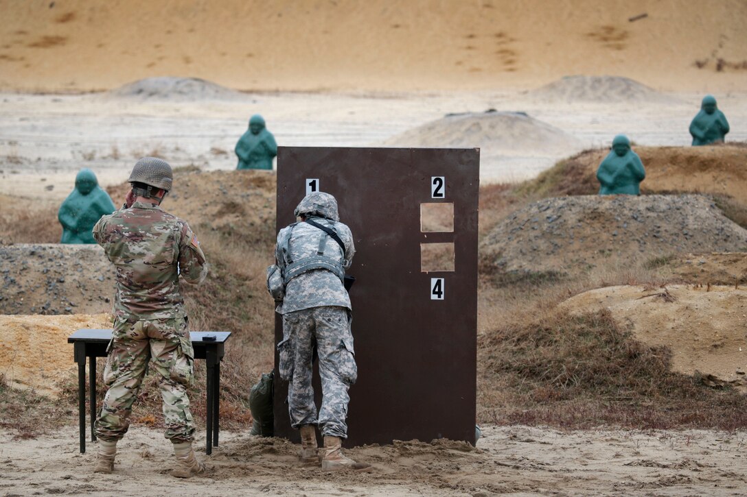 A New Jersey Army National Guard member competes in a timed stress shoot during the Best Warrior 2017 competition at Joint Base McGuire-Dix-Lakehurst, N.J., March 28, 2017. Air National Guard photo by Master Sgt. Matt Hecht