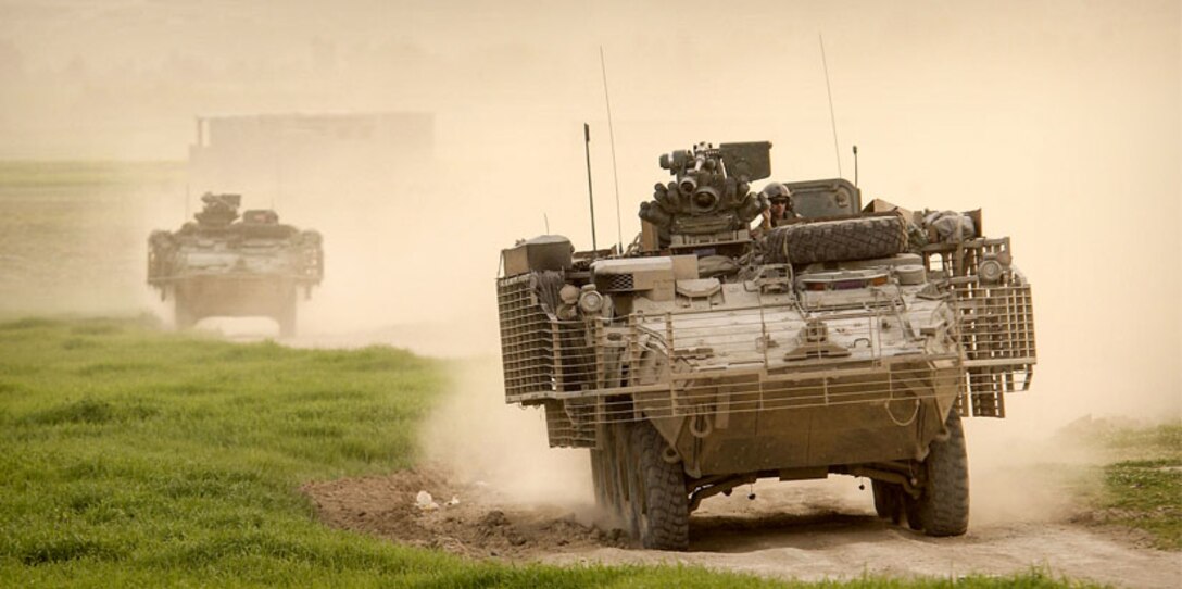A Stryker combat vehicle kicks up plumes of dust while on patrol in Mosul, Iraq, March 31, 2005. Peru is expected to soon sign a deal to purchase Stryker vehicles from the United States. It will be the first foreign military sales deal for the Stryker vehicle. Army leaders have said that it is important for Latin American and other partner nations to consider training, doctrine and sustainment when purchasing hardware such as the Stryker. (Photo Credit: Tech. Sgt. Mike Buytas)