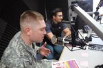 U.S. Army Sgt. Austin Pearce, 129th Mobile Public Affairs Detachment, South Dakota Army National Guard, participates in a live radio broadcast at an Armed Forces Network Korea station at U.S. Army Garrison Daegu, South Korea, March 16, 2017. 129th Soldiers trained in the Republic of Korea from March 12-23 as part of the Key Resolve exercise to sharpen their public affairs and journalism skills. 