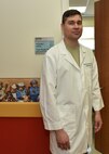 Capt. Travis Sloan, 341st Medical Operations Squadron pediatrician, poses for a photo in support of National Doctors Day at Malmstrom Air Force Base, Mont.  National Doctors Day is observed annually on March 30 and recognizes the accomplishments of doctors around the nation as well as their contributions to society. (U.S. Air Force photo/Jason Heavner)  