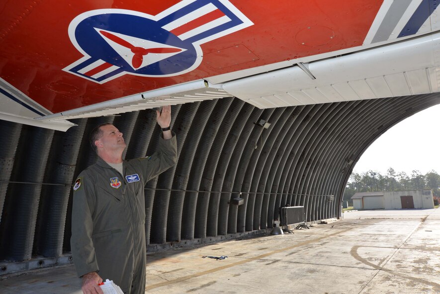 Brig. Gen. Dan Orcutt, First Air Force (Air Forces Northern) Vice Commander, checks the flap of a Civil Air Patrol Cessna C-182 during a pre-flight inspection March 28 at Tyndall Air Force Base, Fla. The aircraft arrived at Tyndall June 24, 2016, as part of CAP’s realignment from Air Education and Training Command to Air Combat Command. With the realignment, the CONR-1st AF (Air Forces Northern) commander has the authority to approve all Civil Air Patrol operational missions when CAP flies in their Air Force Auxiliary role. (U.S. Air Force photo by Mary McHale)