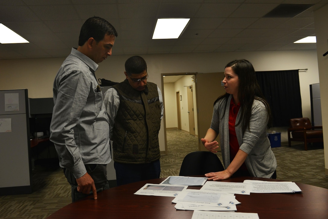 Jordan Directorate of Military Security Capt. Shadi Jumah Al-Tahat, 2nd Border Guard Brigade staff officer, left, and Maj. Fadi Al Majali, Jordanian Military School security officer commander, center, listen as U.S. Air Force Special Agent Shelly Herold, Air Force Office of Special Investigations 2nd Field Investigative Squadron forensic science consultant assigned to Joint Base Andrews, Maryland, right, briefs them about forensic science at Shaw Air Force Base, S.C., March 28, 2017. Herold also provided them with a demonstration, giving them a hands-on opportunity to learn about how bloodstain pattern analysis works. (U.S. Air Force photo by Airman 1st Class Destinee Sweeney)