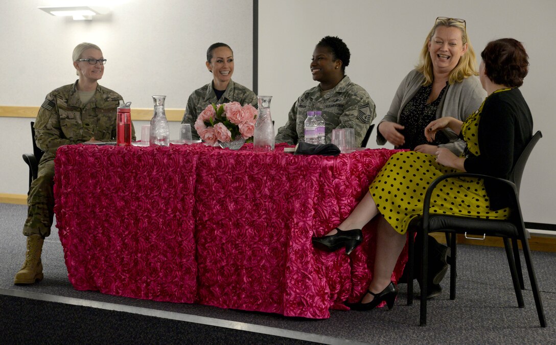 From left to right, Lt. Col. Seanna Less, 352nd Special Operations Aircraft Maintenance Squadron commander; Chief Master Sgt. Hope Skibitsky, 48th Medical Operations Squadron superintendent; Senior Master Sgt. Tara Thompson, 100th Logistics Readiness Squadron flight chief; Sue Winegardner, spouse of Chief Master Sgt. Richard Winegardner, 352nd Special Operations Wing commander; and Kara Neave, 100th Operation Support Squadron flight data analyst, speak at the Women’s History Month speakers’ panel March 24, 2017, on RAF Mildenhall, England. The open forum allowed the panel to speak on personal experiences distinguished by gender stereotypes or inequality and for attendees to ask questions. (U.S. Air Force photo by Senior Airman Justine Rho)

