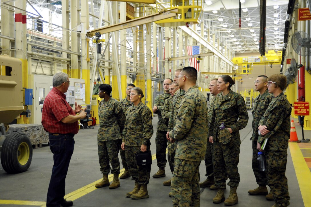 Brig. Gen. Helen G. Pratt (center), commanding general, 4th Marine Logistics Group, Marine Forces Reserve, along with leaders from multiple combat logistics battalions, attended The Commanders Conference at Marine Corps Logistics Base Albany, Ga., Feb. 2-4, 2017. Leaders with 4th MLG gathered together to broaden their perspectives and understanding of 4th MLG issues while facilitating integration efforts between 4th Marine Corp Logistics Command senior leaders. Additionally, 4th MLG commanders were provided guidance on damages caused by a tornado that touched down on base in January. (Courtesy photo by Capt. Jason Ryu) 