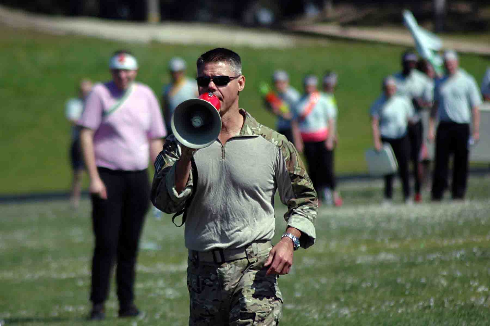 Lt. Col. James McCullough, commander of the 311th Training Squadron, fills in his Airmen on the rules of engagement for the unit's combat dining-in at the Hilltop Track March 11. (Photo Credit: Mr. Brian Lepley (Presidio))