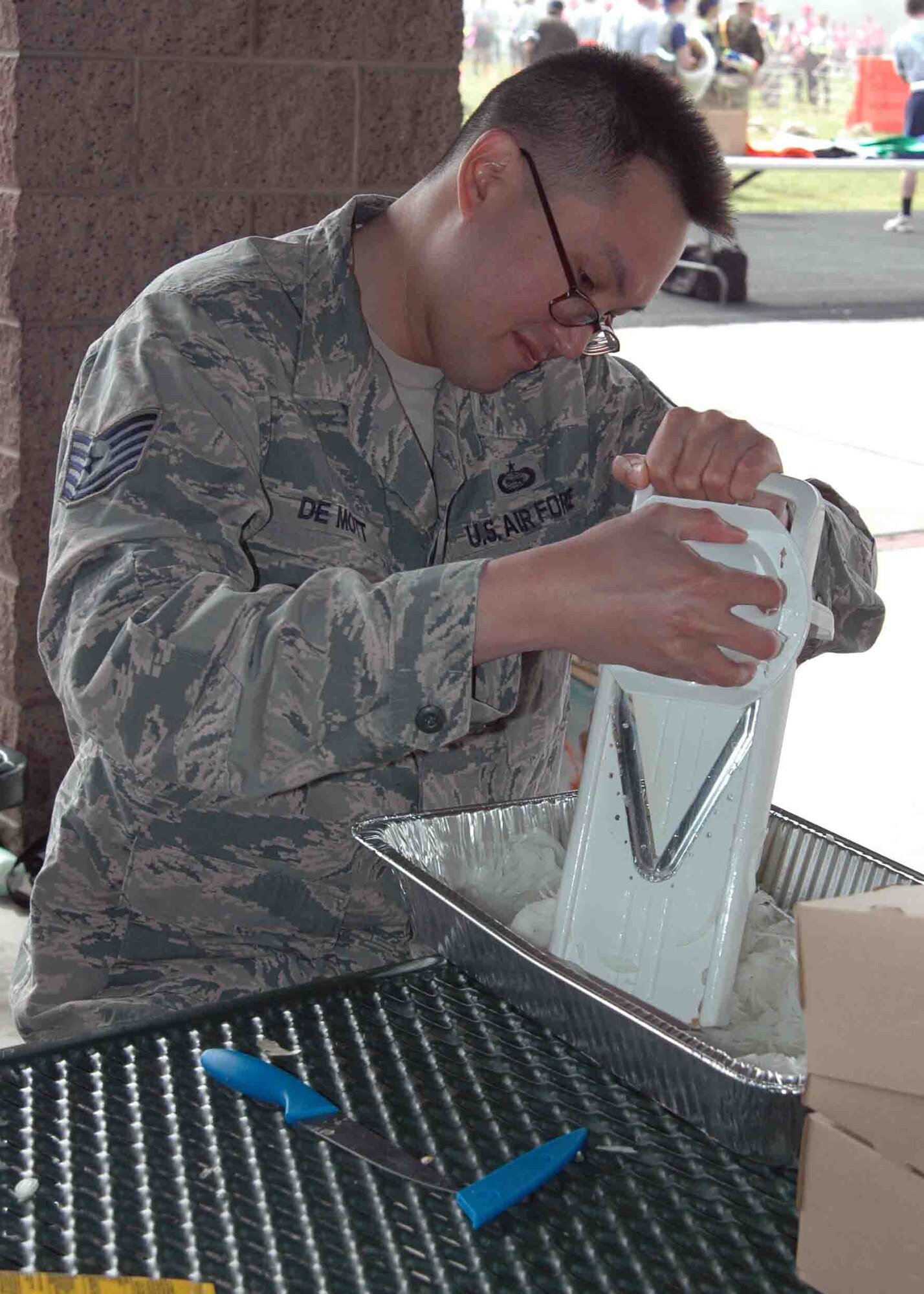 Tech Sgt. Jason DeMott of the 311th Training Squadron completes one of his assigned duties at the Hilltop Track March 11 during the unit's combat dining-in. (Photo Credit: Mr. Brian Lepley (Presidio))