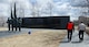 Peter Vielandi (left), Air Force District of Washington, and Sam Hunt, Air Force Memorial facility manager, walk past statues portraying Airmen from the U.S. Air Force Honor Guard March 28, 2017 at the U.S. Air Force Memorial in Arlington, Virginia. The Air Force Memorial Foundation, which dedicated the Memorial to the U.S. Air Force as a gift in 2006, has since maintained the memorial grounds and managed day-to-day operations.  (U.S. Air Force photo by Staff Sgt. Joe Yanik)