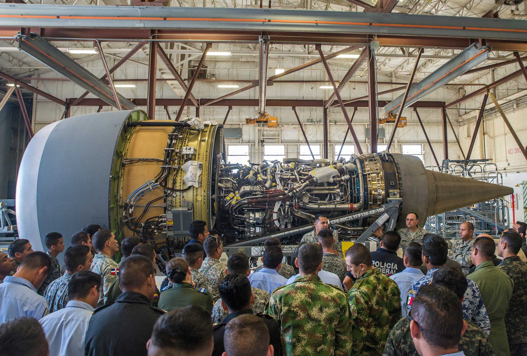 Students from the  Inter-American Air Forces Academy visited the 433rd Maintenance Squadron engine shop  March 29, 2017 at Joint Base San Antonio-Lackland, Texas. As part of their tour the students toured a C-5M Super Galaxy aircraft and visited the structural, metals, and survival shops.  (U.S. Air Force photo by Benjamin Faske)