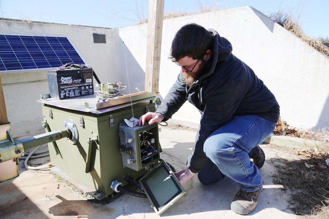 Jared Matthews, target systems worker with the Directorate of Plans, Training, Mobilization and Security Range Maintenance team, works on an automated target March 10, 2017, on Range 2 on North Post at Fort McCoy, Wis. The work was in preparation for range use by service members training in Operation Cold Steel, an Army Reserve exercise. Range Maintenance personnel make sure range and training areas at Fort McCoy remain operational, and they take care of service members as they train on the ranges. Range Maintenance also has engineering personnel who complete various projects for the installation range complex. (U.S. Army Photo by Scott T. Sturkol, Public Affairs Office, Fort McCoy, Wis.)