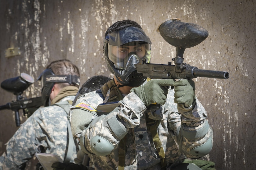 U.S. Army Spc. Julian Ditona, right, a multi-channel transmission systems operator assigned to the 98th Expeditionary Signal Battalion, keeps an eye out for simulated enemy activity during an urban operations scenario event at Fort Huachuca, Arizona, March 29, 2017. Ditona and seven other Soldiers competed in the command’s 2017 Best Warrior Competition, in hopes of representing their unit at the U.S. Army Reserve Command’s 2017 Best Warrior Competition later this year. (U.S. Army photo by Sgt. 1st Class Brent C. Powell)