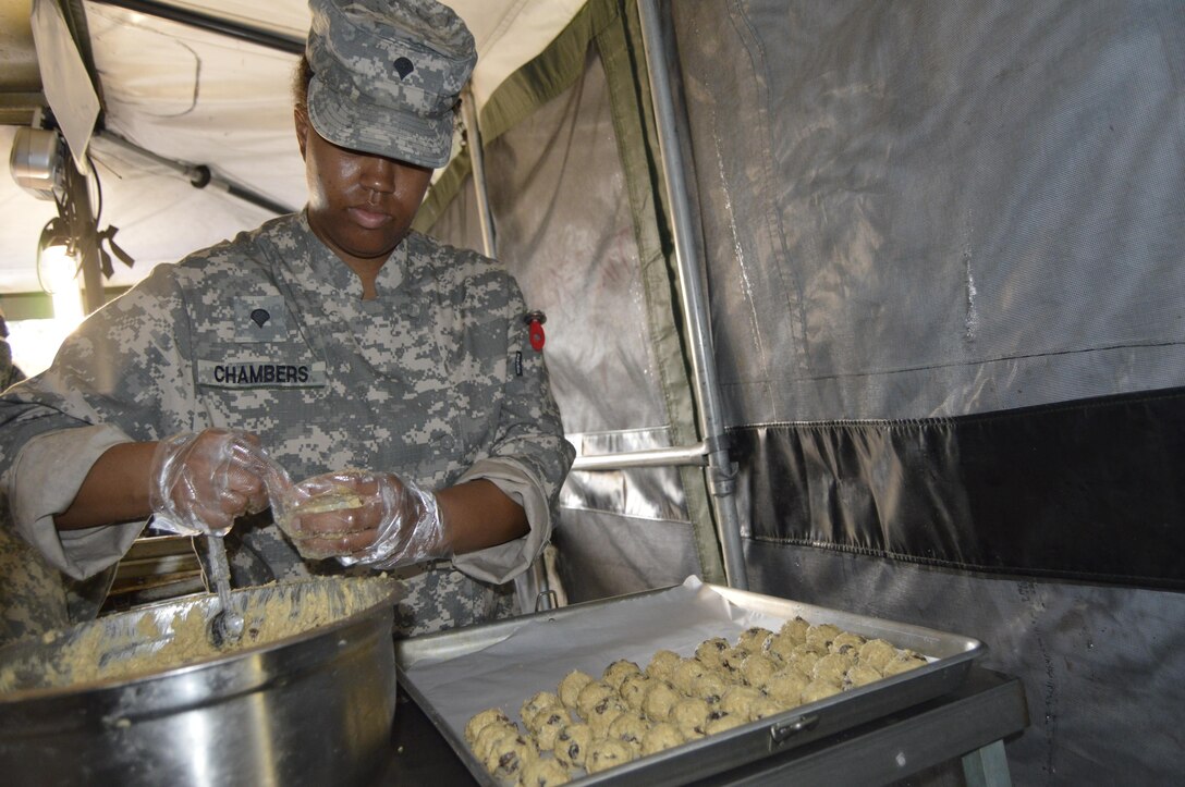 U.S. Army Reserve Spc. Christen Chambers, a food operations specialist assigned to the 1002nd Quartermaster Company in Beaumont, Texas, prepares cookie dough for baking during the Philip A. Connelly cooking competition held at Fort Polk, Louisiana, March 25, 2017. During the Philip A. Connelly Program, the U.S. Army Reserve partners with the National Restaurant Association to give food service personnel an opportunity to demonstrate their capability and combat-readiness while competing for recognition. (U.S. Army Reserve photo by Master Sgt. Dave Thompson)