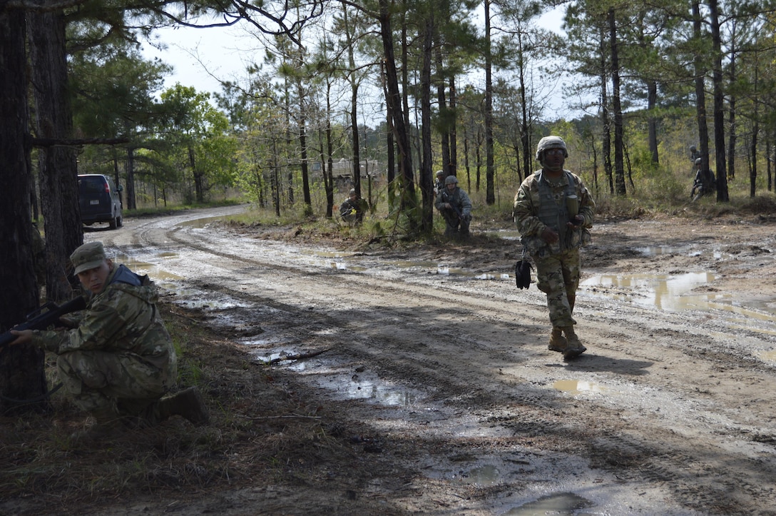 Soldiers with the U.S. Army Reserve’s 1002nd Quartermaster Company from Beaumont, Texas, man their fighting positions as their first sergeant, U.S. Army Reserve 1st Sgt. Shawn Ledet leads them on during their Field Training Exercise March 25, 2017. The 1002nd is a subordinate unit of the 4th Sustainment Command (Expeditionary) and part of America’s Army Reserve. These units are trained, combat-ready and equipped to provide military and logistical support in any corner of the globe. (U.S. Army Reserve photo by Master Sgt. Dave Thompson)