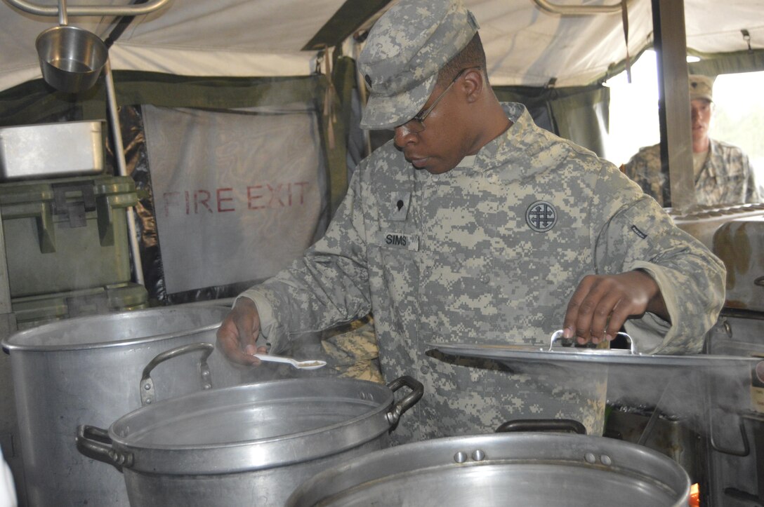 U.S. Army Reserve Spc. Jamal Sims, a culinary specialist assigned to the 1002nd Quartermaster Company in Beaumont, Texas, takes a sample of beef barley soup during the Philip A. Connelly cooking competition held at Fort Polk, Louisiana, March 25, 2017. During the Philip A. Connelly Program, the U.S. Army Reserve partners with the National Restaurant Association to give food service personnel an opportunity to demonstrate their capability and combat-readiness while competing for recognition. (U.S. Army Reserve photo by Master Sgt. Dave Thompson)
