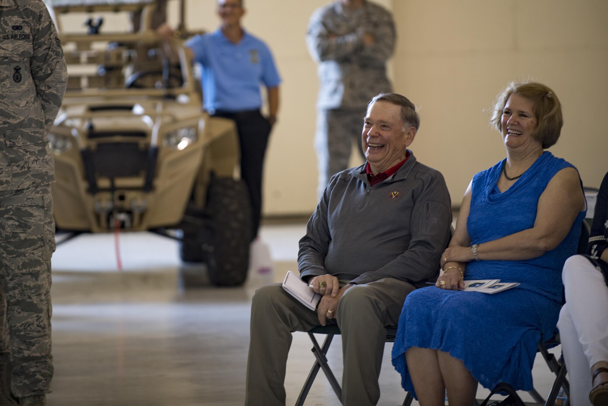Retired chief of staff Gen. John Jumper and his wife, Ellen, laugh during the opening ceremonies of the 820th Base Defense Group’s 20th Anniversary Ceremony, March 28, 2017, at Moody Air Force Base, Ga. Jumper was a command pilot with more than 5,000 flying hours, including 1,400 combat hours. The celebration included an 820th BDG capabilities demo, a reenlistment ceremony and a formal dinner. (U.S. Air Force photo by Airman 1st Class Daniel Snider)