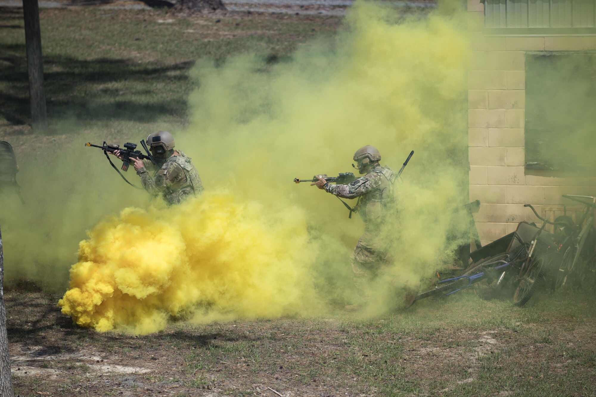 Airmen from the 822d Base Defense Squadron conduct a tactical demo during the 820th Base Defense Group’s 20th Anniversary Ceremony, March 28, 2017, at Moody Air Force Base, Ga. Retired chief of staff Gen. John Jumper and his wife, Ellen, and many former members of the 820th BDG visited to celebrate the anniversary. (U.S. Air Force photo by Airman 1st Class Daniel Snider)