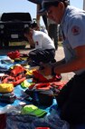 A first responder from the Mexican state of Michoacán’s Civil Protection takes inventory of his new equipment donated by U.S. Northern Command in Puerto Vallarta on March 20, 2017. This is part of USNORTHCOM's partnership with Mexico to train and equip Mexican first responders as USNORTHCOM donated $270,000 of water search and rescue gear. (Photo by U.S. Air Force 1st Lt. Lauren Hill/Released)