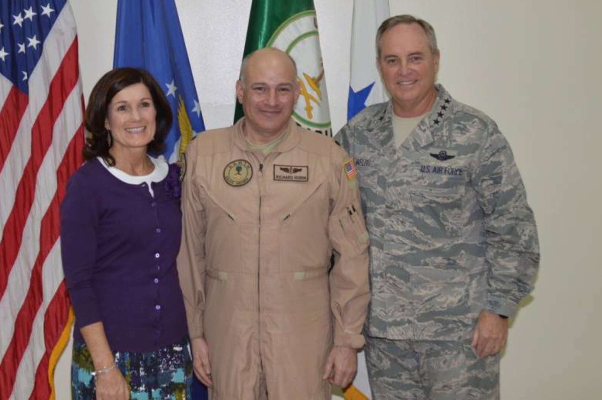 Lt. Col. Richard Rubin, 92nd Aerospace Medicine Squadron flight surgeon, and his wife pose for a photo with Gen. Mark A. Welsh III, former Chief of Staff of the Air Force. Rubin discovered a new syndrome called the vision impairment and intracranial pressure syndrome while working for NASA between 2006 and 2009. (Courtesy photo)