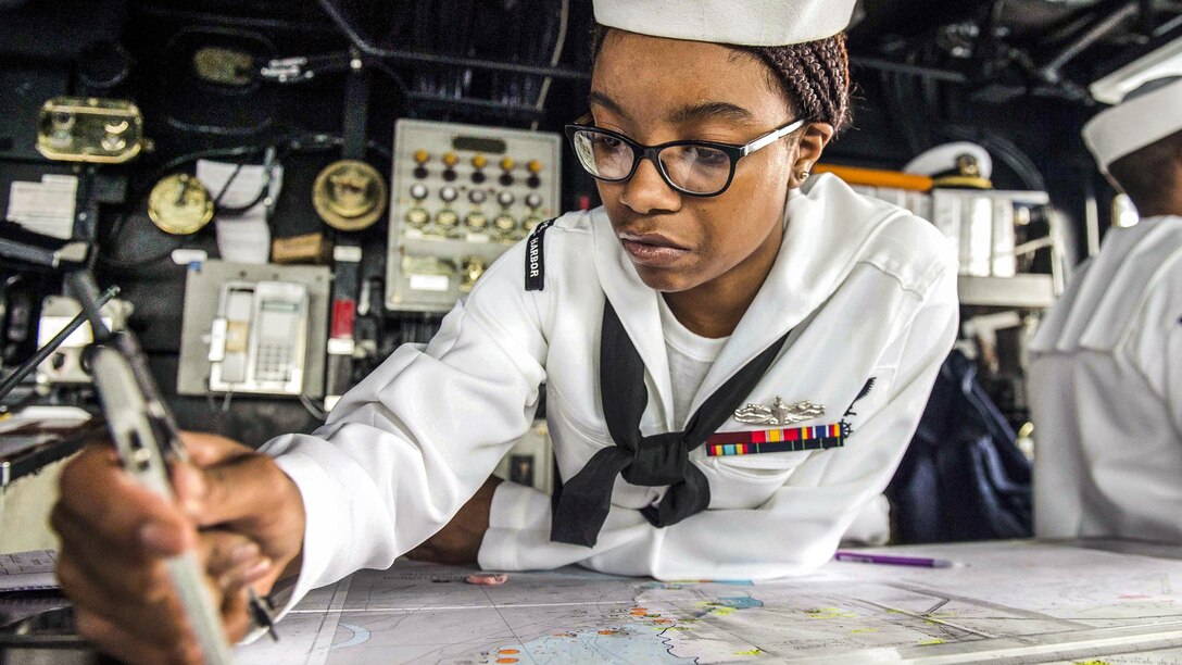 Navy Petty Officer 3rd Class Tyler Terrell plots a course during a bridge watch on the USS Comstock as the ship arrives in Colombo, Sri Lanka, March 27, 2017, to conduct theater security cooperation events with the Sri Lankan navy and marines. Terrell is a quartermaster. The Comstock is operating in the U.S. 7th Fleet area of operations. Navy photo by Petty Officer 3rd Class Abby Rader