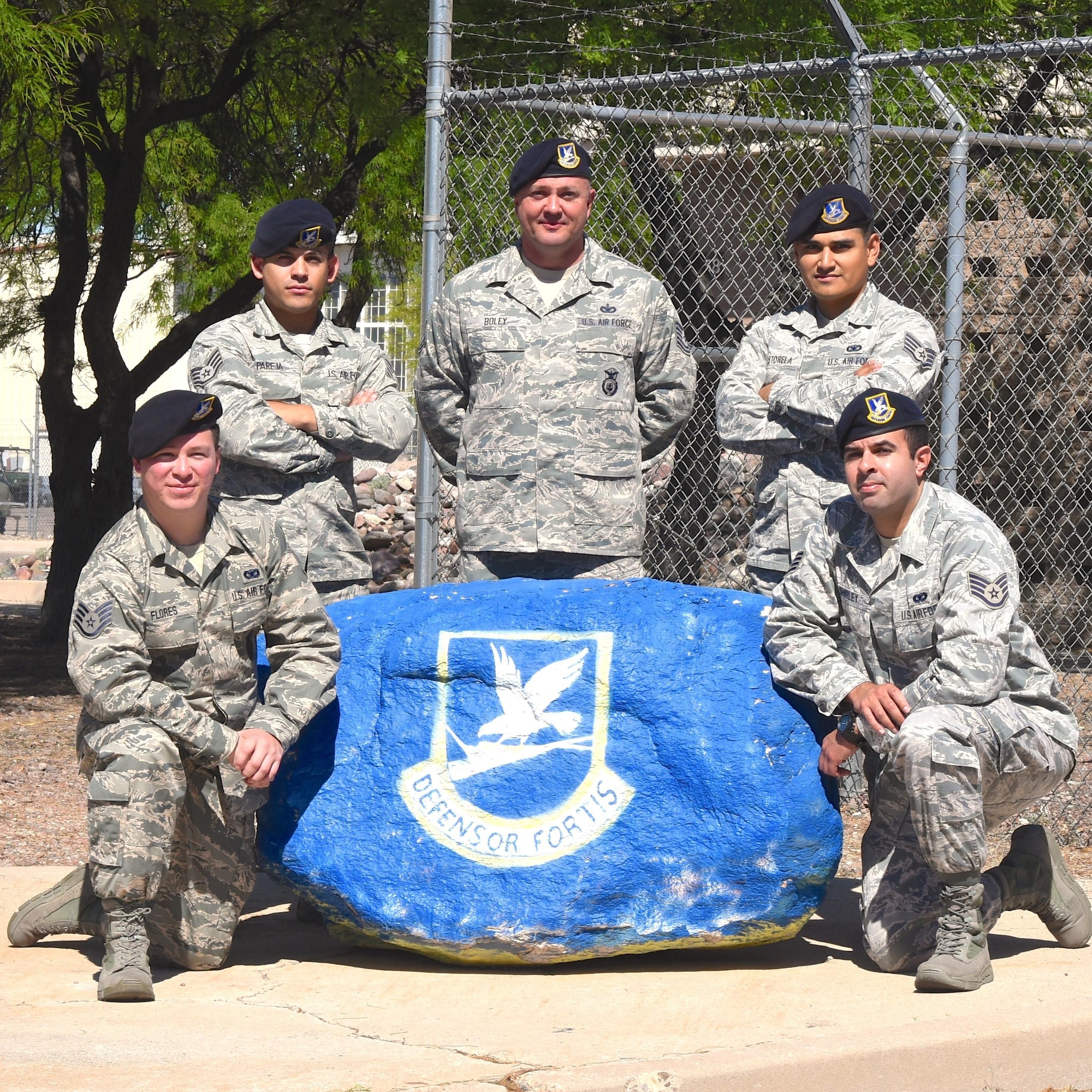 U.S. Air Force Reserve security forces members Tech. Sgt. Chris Boley and staff sergeants Juan Pareja, Francisco Shirley, Joshua Castorela, and Jose Flores are scheduled to deploy to the Dominican Republic next week from Davis-Monthan Air Force Base, Ariz. All five members are Spanish proficient and part of the 720th Security Forces Squadron, and looking forward to supporting this 12th Air Force (Air Forces South) humanitarian operation. The 720th SFS geographically-separated unit of the 920th Rescue Wing, at Patrick Air Force Base, Fla. (U.S. Air Force photo by Carolyn Herrick)