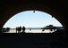 Wings of Blue Parachute Team cadets prepare their gear in a hangar before a jump, March 29, 2017 at the Barry M. Goldwater Range in Gila Bend, Ariz. Arizona hosts an ideal climate for the Wings of Blue to skydive and practice parachute maneuvers during their annual spring training. (U.S. Air Force photo by Airman 1st Class Caleb Worpel)