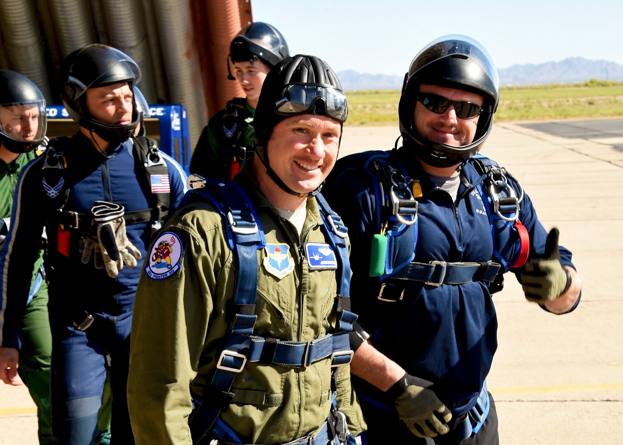Lt. Col. Jason Bartels, 62nd Fighter Squadron pilot, prepares to skydive for the first time with the Wings of Blue Parachute Team, March 29, 2017 at the Barry M. Goldwater Range in Gila Bend, Ariz. Throughout the week, Luke AFB supported the Wings of Blue mission by coordinating the use of the range and allowing the use of the facilities in Gila Bend.  (U.S. Air Force photo by Airman 1st Class Caleb Worpel)