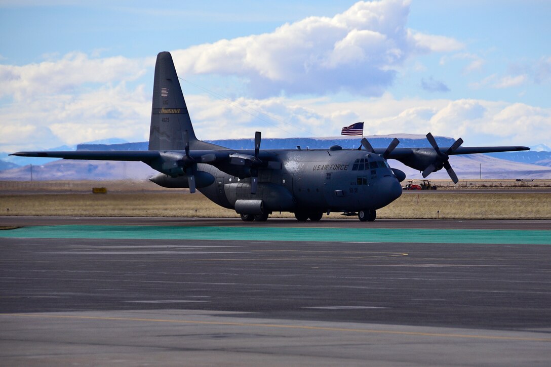 A C-130 Hercules aircraft assigned to the 120th Airlift Wing of the Montana Air National Guard returns with personnel from a deployment to Southwest Asia March 3, 2017. 