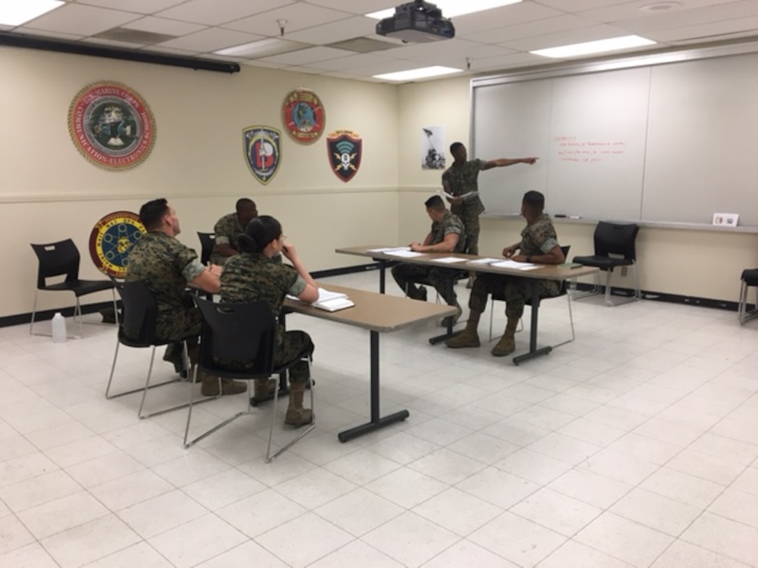 Sergeant Terrance R. Wiley of Headquarters Company, Marine Corps Communication-Electronics School engages the students of the Lance Corporal Leadership and Ethics Seminar Course 2-17. Sergeant Wiley’s primary duties are as the Platoon Sergeant for Supply Section in Headquarters Company.