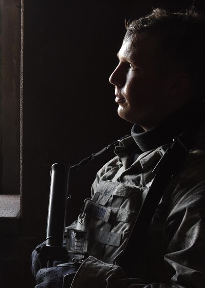 U.S. Air Force Senior Airman Travis Glasgow, a patrolman with the 379th Expeditionary Security Forces Squadron, listens during a debrief of an active shooter training exercise at Al Udeid Air Base, Qatar, March 30, 2017. Active shooter incident response training helps prepare patrol Airmen for possible real-world situations they may respond too. (U.S. Air Force photo by Senior Airman Cynthia A. Innocenti)