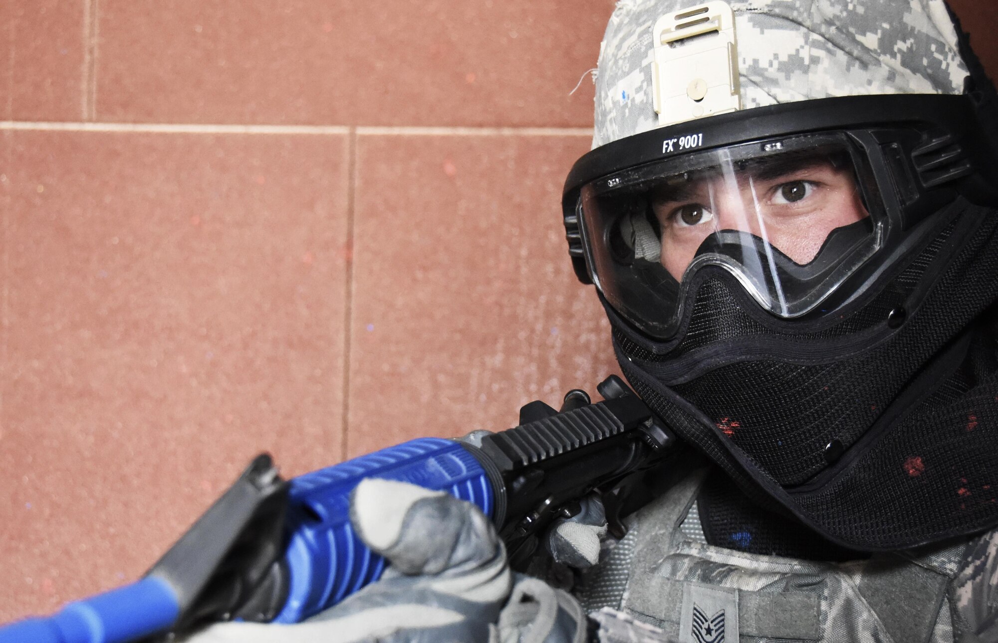 U.S. Air Force Tech. Sgt. Timothy Lombardi, a patrolman with the 379th Expeditionary Security Forces Squadron, secures a threshold in an active shooter training facility at Al Udeid Air Base, Qatar, March 30, 2017. Active shooter incident response training helps prepare patrol Airmen for possible real-world situations they may respond too. (U.S. Air Force photo by Senior Airman Cynthia A. Innocenti)