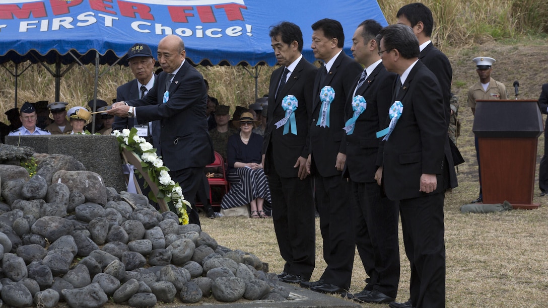 Japanese officials pay tribute to an Iwo Jima memorial during a water dedication ceremony as part of the 72nd Reunion of Honor on Iwo To, Japan March 25, 2017. The event presented the opportunity for the U.S. and Japanese people to mutually remember and honor thousands of service members who fought and died on the hallowed grounds of Iwo Jima.
