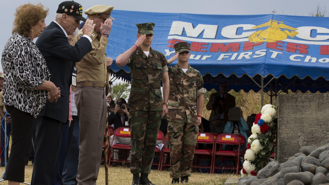 World War II veterans salute a memorial after placing a wreath at the base during a wreath-laying presentation as part of the 72nd Reunion of Honor ceremony on Iwo To, Japan March 25, 2017. The event presented the opportunity for the U.S. and Japanese people to mutually remember and honor thousands of service members who fought and died on the hallowed grounds of Iwo Jima.