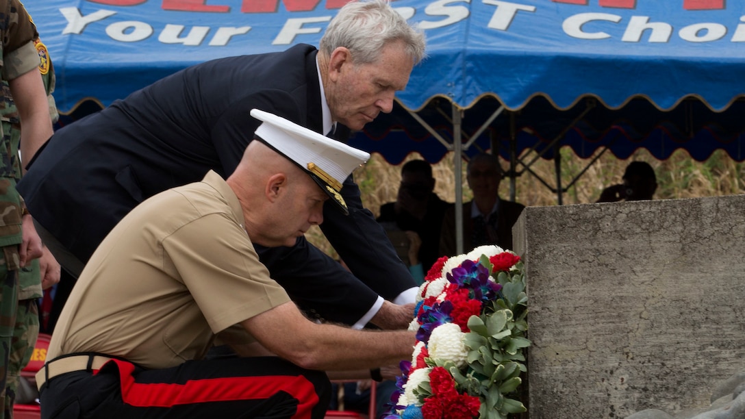 U.S. Marine Corps Lt. Gen. David Berger, commander, Marine Corps Forces Pacific and Lt. Gen. (Ret) Norman Smith place a wreath at the base during a wreath-laying presentation as part of the 72nd Reunion of Honor ceremony on Iwo To, Japan March 25, 2017. The event presented the opportunity for the U.S. and Japanese people to mutually remember and honor thousands of service members who fought and died on the hallowed grounds of Iwo Jima.