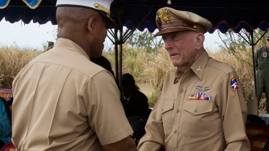 Iwo Jima veteran Capt. Jerome Yellin shakes hands with Maj. Gen. Craig Timberlake, commanding general, 3d Marine Division, at the 72nd Reunion of Honor commemorative service on Iwo To, Japan March 25, 2017. Yellin was one of eight veterans in attendance alongside American and Japanese distinguished guests, both military and civilian. This event presented the opportunity for the U.S. and Japanese people to mutually remember and honor thousands of service members who fought and died on the hallowed grounds of Iwo Jima.