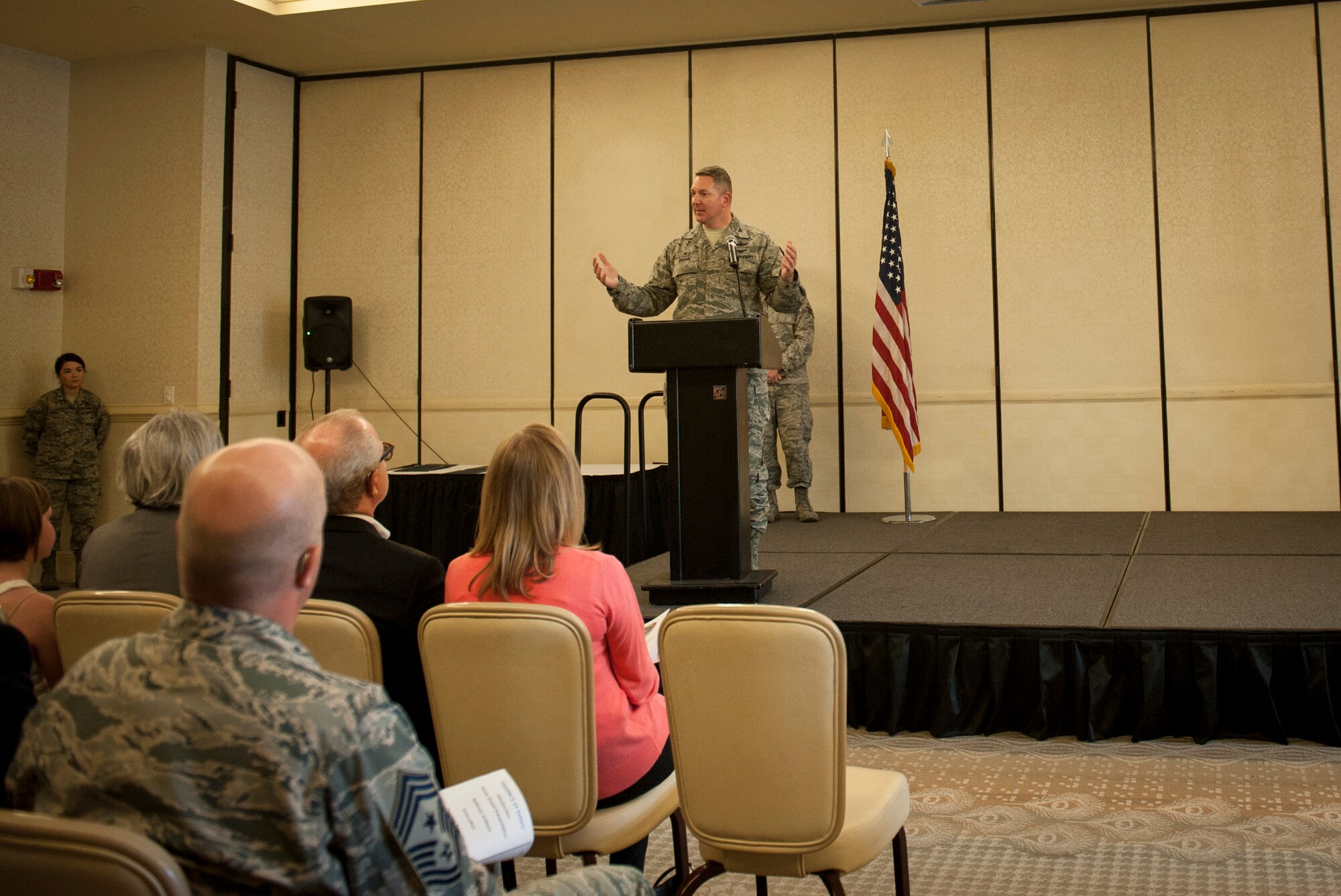 Col. Robert Lyman, Joint Base Charleston commander speaks during the honorary commanders induction ceremony, March 24, 2017 at Joint Base Charleston, South Carolina. The honorary commanders program partners professionals from a variety of areas keep with commanders to strengthen the relationship between the base and local community. 