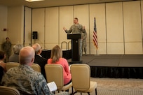Col. Robert Lyman, Joint Base Charleston commander speaks during the honorary commanders induction ceremony, March 24, 2017 at Joint Base Charleston, South Carolina. The honorary commanders program partners professionals from a variety of areas keep with commanders to strengthen the relationship between the base and local community. 