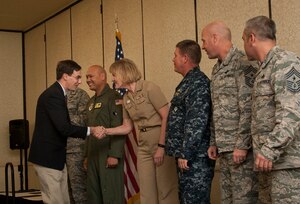 Joint Base Charleston leadership welcomes Matthew Hasbrouck, Trident Health chief operations officer, into the honorary commanders program at Joint Base Charleston, South Carolina, March 24, 2017. The honorary commanders program partners professionals from a variety of areas keep with commanders to strengthen the relationship between the base and local community. 