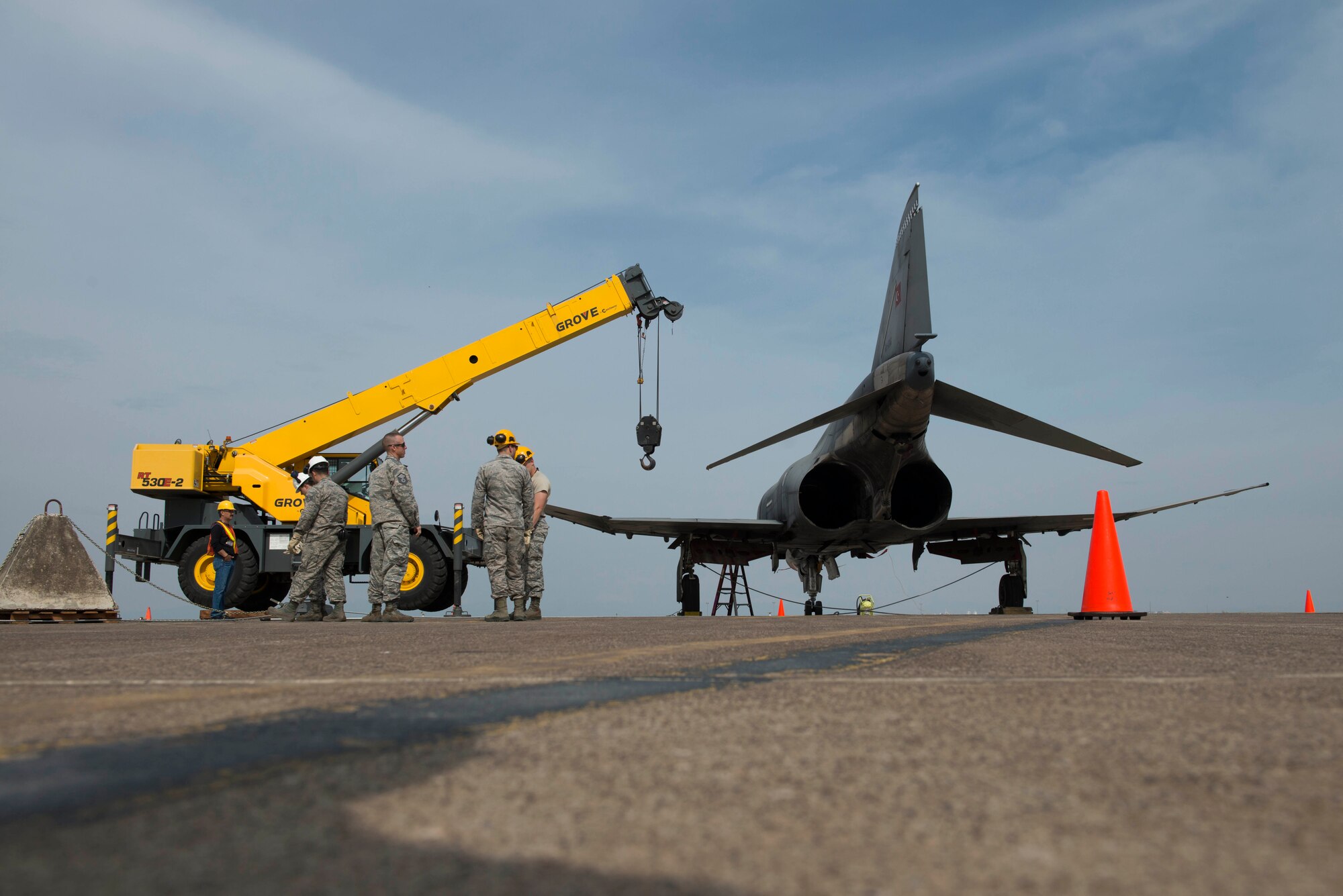 Members of the 39th Maintenance Squadron speak with a representative from the 39th Air Base Wing Safety Office in preparation for Crash Damaged Disabled Aircraft Recovery (CDDAR) training March 30, 2017, at Incirlik Air Base, Turkey. The Airmen conducted this training in conjunction with a basewise major accident response exercise. The primary objective of the CDDAR mission is to quickly and safely remove immobile aircraft and return the runway to operational status. (U.S. Air Force photo by Airman 1st Class Devin M. Rumbaugh)