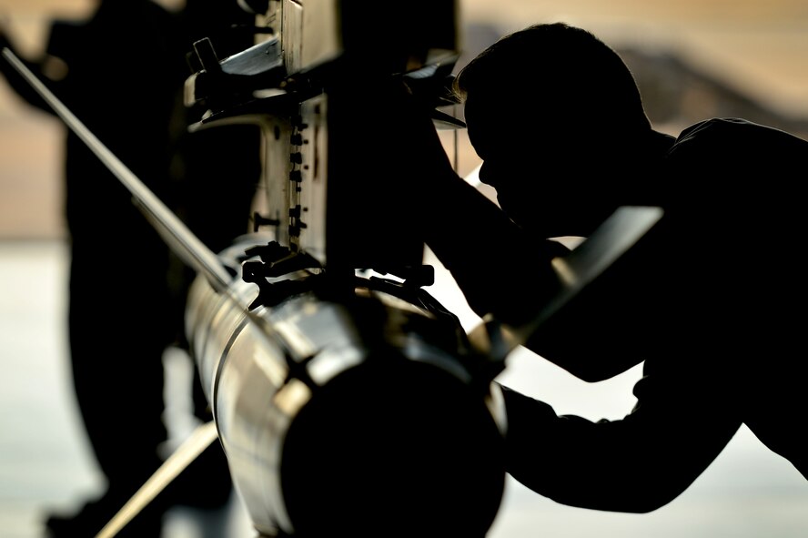 Senior Airman John Kay, a 20th Maintenance Group weapons load team member, inspects an AGM-88 HARM training missile at the 20th MXG weapons standardization and evaluation hangar at Shaw Air Force Base, S.C., March 22, 2017. Load crew Airmen are tasked with mounting and ensuring all munitions on aircraft are safe and ready for use. (U.S. Air Force photo/Airman 1st Class Christopher Maldonado)