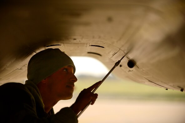 An F-15C Eagle crew chief performs maintenance at Leeuwarden Air Base, Netherlands, March 24, 2017. F-15C's from the Louisiana and Florida Air National Guard's 159th Expeditionary Fighter Squadron deployed to Europe to participate in a theater security package. The F-15s will conduct training alongside NATO allies to strengthen interoperability and to demonstrate U.S. commitment to the security and stability of Europe. (U.S. Air Force photo/Tech. Sgt. Staci Miller)